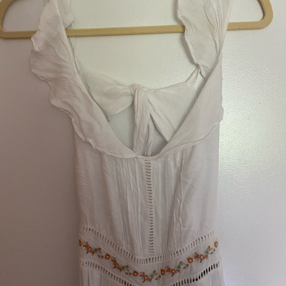 White and floral jump suit